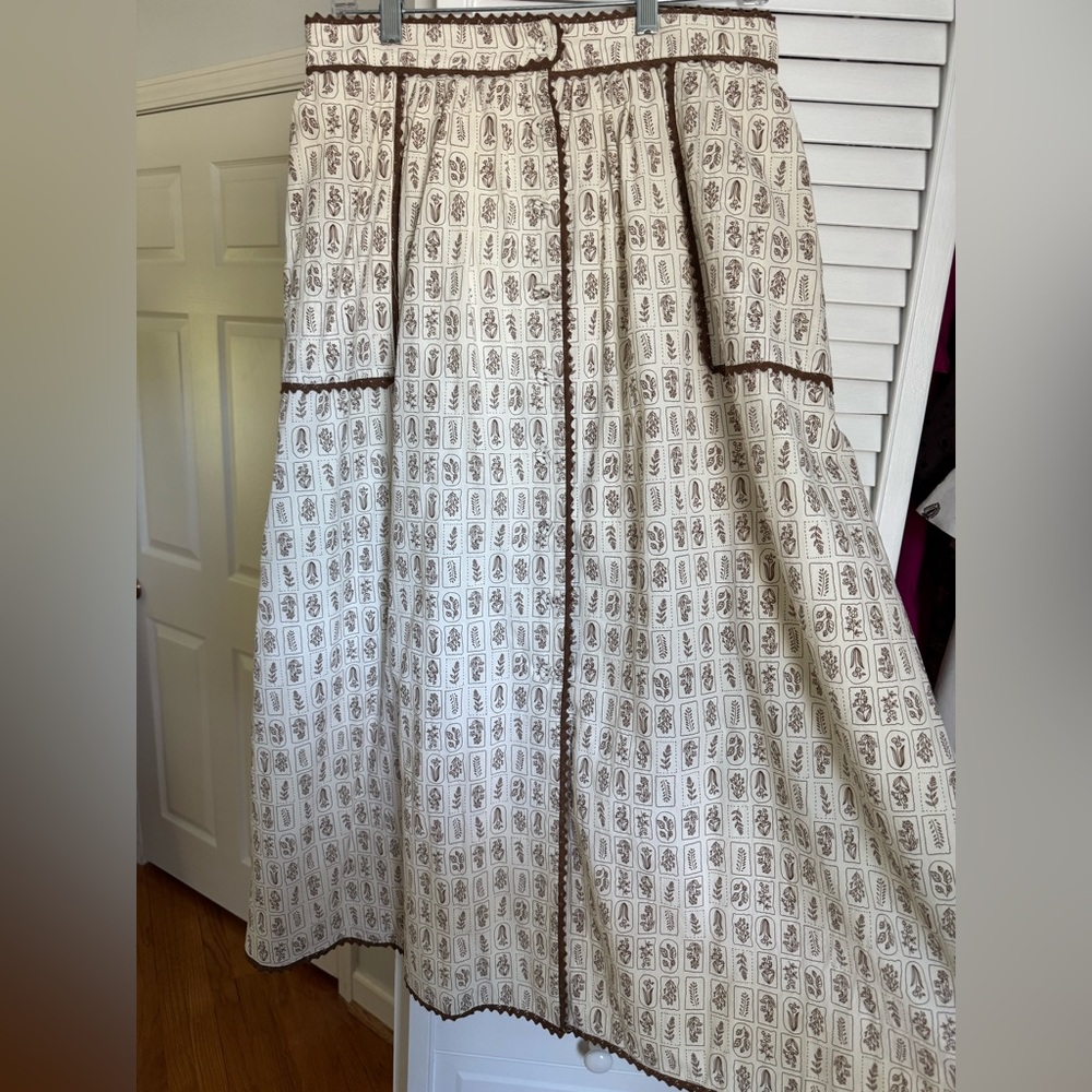 Floral midi with brown trim